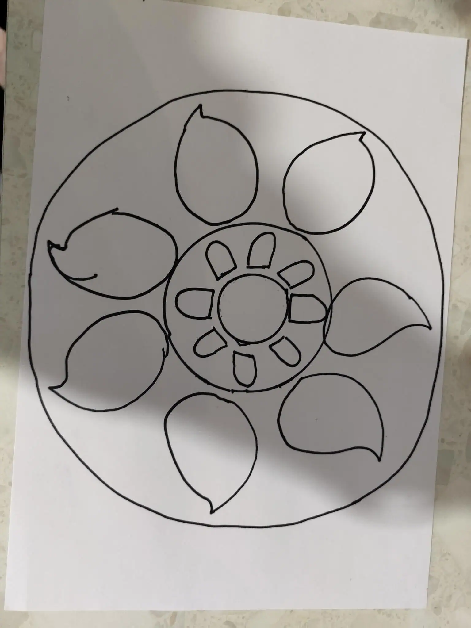 Rangoli_Pattern Coloring sheet of a pizza with various toppings for children at Monkey Puzzle Day Nursery & Preschool Lightwater.